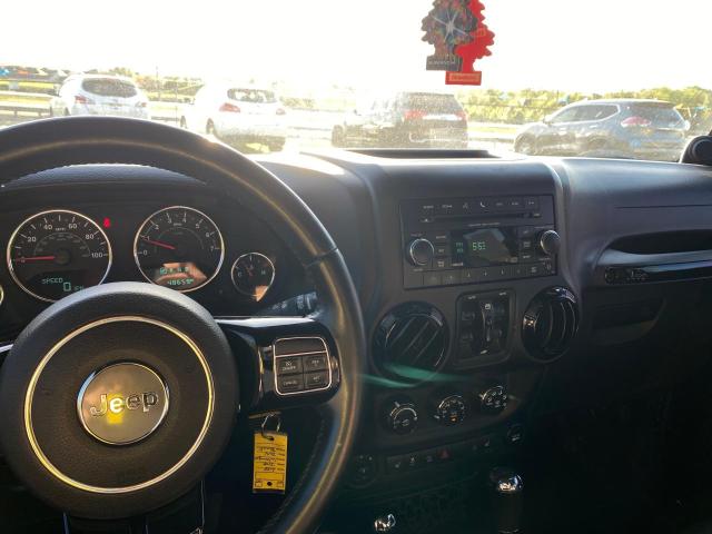 Photo 9 from auction – 2014 JEEP WRANGLER U with VIN 1C4BJWEGXEL319801