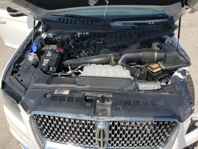 Photo 12 from auction – 2021 LINCOLN NAVIGATOR with VIN 5LMJJ2KT0MEL18884