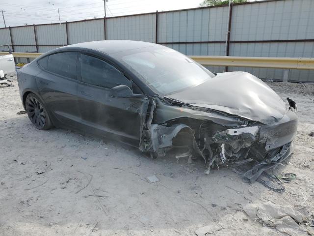 Photo 4 from auction – 2022 TESLA MODEL 3 with VIN 5YJ3E1ECXNF338845