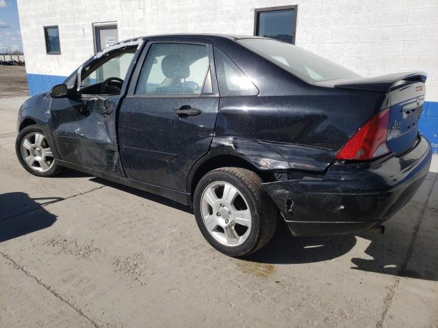 Photo 2 from auction – 2004 FORD FOCUS with VIN 1FAHP38ZX4W177022