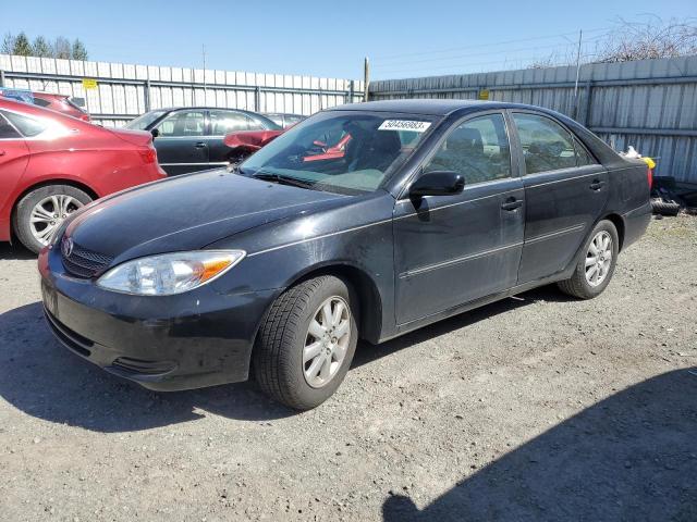TOYOTA CAMRY 2002 with VIN JTDBF30K120065985 - Photo from auction