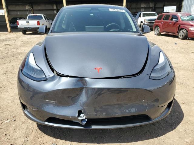 Photo 5 from auction – 2023 TESLA MODEL Y with VIN 7SAYGDEFXPF700125