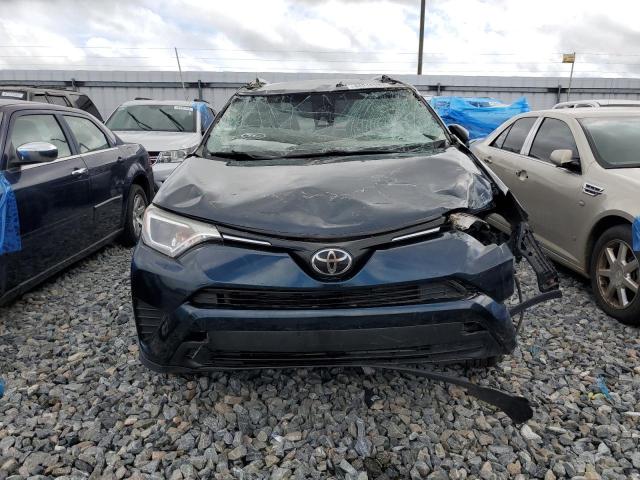 Photo 5 from auction – 2017 TOYOTA RAV4 LE with VIN JTMZFREV6HJ116288