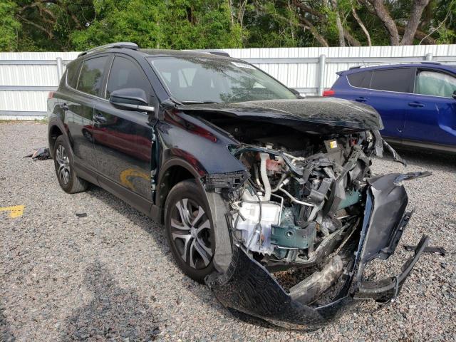 Photo 4 from auction – 2017 TOYOTA RAV4 LE with VIN JTMZFREV4HJ123210