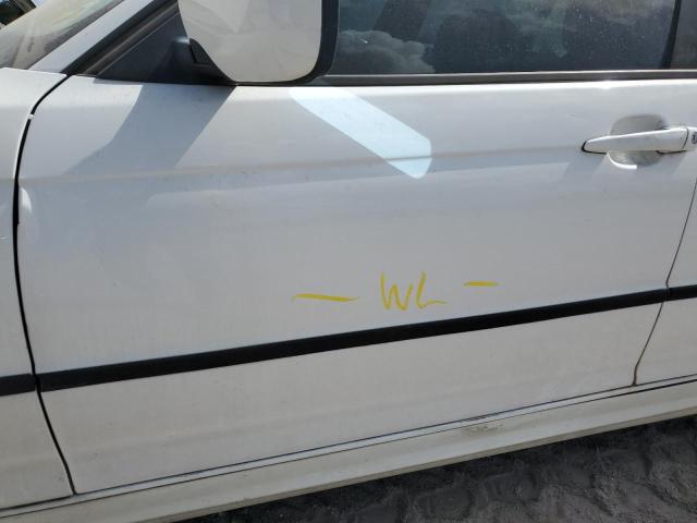 Photo 12 from auction – 2003 BMW 325 I with VIN WBAET37443NJ34070