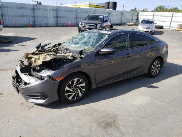 Photo 1 from auction – 2018 HONDA CIVIC EX with VIN 2HGFC2F79JH576315