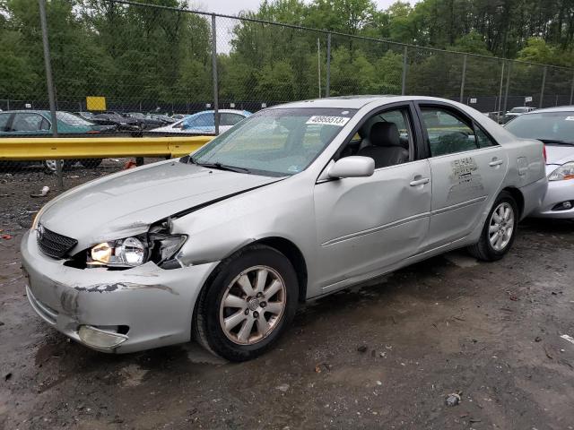 TOYOTA CAMRY LE 2004 with VIN 4T1BE30K14U289736 - Photo from auction