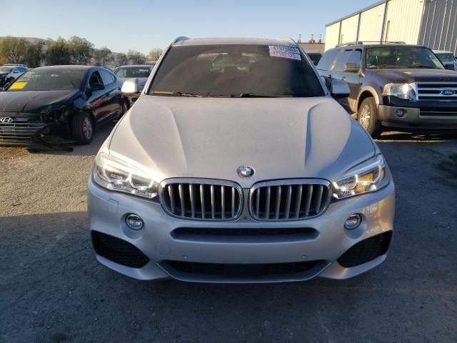 Photo 5 from auction – 2016 BMW X5 XDRIVE5 with VIN 5UXKR6C58G0J81057