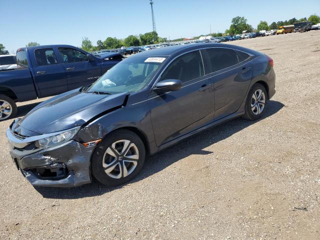 HONDA CIVIC LX 2018 with VIN 19XFC2F58JE009344 - Photo from auction