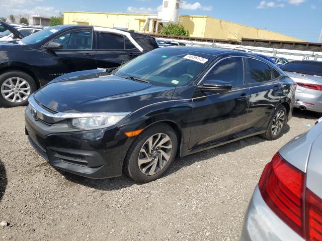HONDA CIVIC EX 2018 with VIN 19XFC2F75JE017984 - Photo from auction