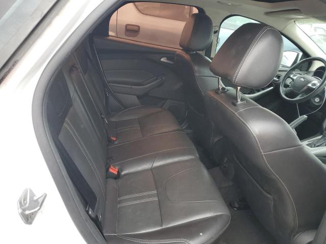 Photo 10 from auction – 2014 FORD FOCUS SE with VIN 1FADP3F22EL247992