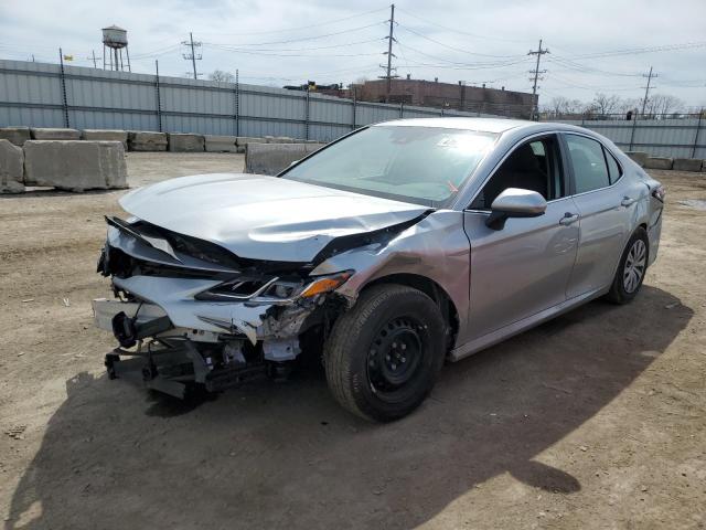 TOYOTA CAMRY LE 2022 with VIN 4T1C31AK7NU596682 - Photo from auction