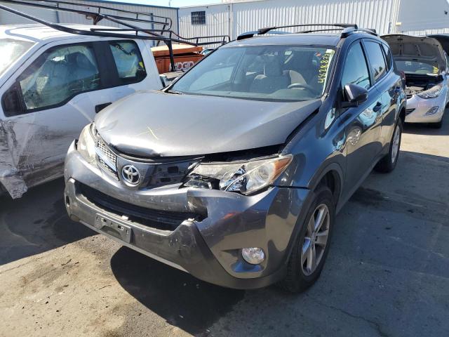 TOYOTA RAV4 XLE 2014 with VIN JTMWFREV8ED027335 - Photo from auction