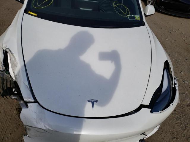 Photo 11 from auction – 2022 TESLA MODEL 3 with VIN 5YJ3E1EBXNF106799