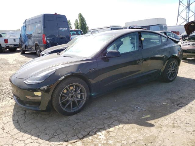 TESLA MODEL 3 2021 with VIN 5YJ3E1EA9MF098717 - Photo from auction