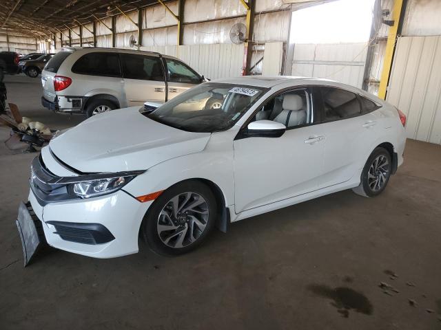 HONDA CIVIC EX 2018 with VIN 19XFC2F77JE012561 - Photo from auction