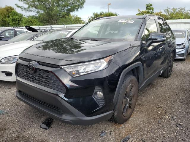 TOYOTA RAV4 XLE 2019 with VIN JTMW1RFV7KD504054 - Photo from auction