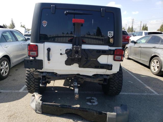 Photo 6 from auction – 2016 JEEP WRANGLER U with VIN 1C4BJWDG9GL168762