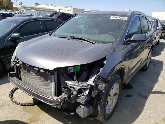 Photo 1 from auction – 2015 HONDA CR-V EXL with VIN 2HKRM3H75FH553530