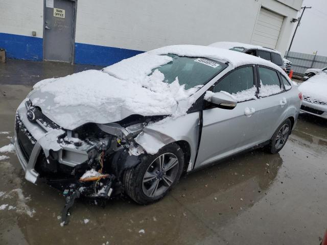FORD FOCUS SE 2014 with VIN 1FADP3F25EL311510 - Photo from auction