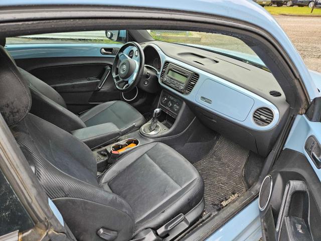 Photo 5 from auction – 2013 VOLKSWAGEN BEETLE with VIN 3VWJX7AT4DM662276