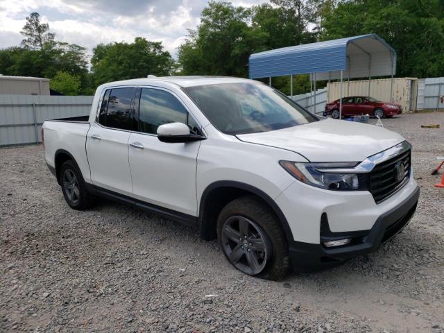 Photo 4 from auction – 2023 HONDA RIDGELINE with VIN 5FPYK3F74PB007782