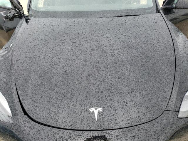Photo 12 from auction – 2022 TESLA MODEL Y with VIN 7SAYGDEF6NF318252
