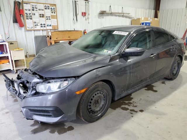 HONDA CIVIC LX 2018 with VIN 2HGFC2F54JH514982 - Photo from auction