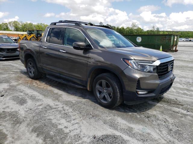 Photo 4 from auction – 2021 HONDA RIDGELINE with VIN 5FPYK3F72MB018954