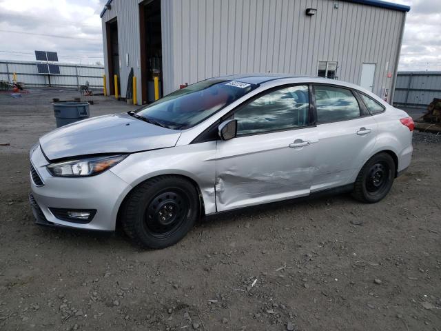 FORD FOCUS SE 2016 with VIN 1FADP3F27GL380623 - Photo from auction