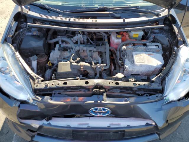 Photo 11 from auction – 2014 TOYOTA PRIUS C with VIN JTDKDTB35E1570521