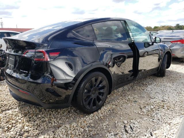 Photo 3 from auction – 2021 TESLA MODEL Y with VIN 5YJYGAEE0MF228645