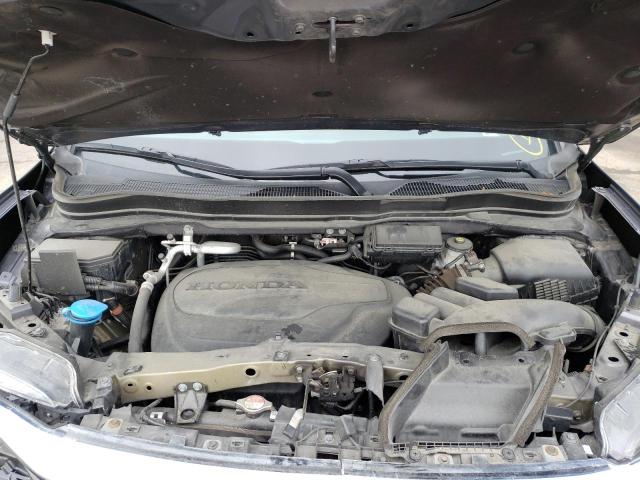 Photo 11 from auction – 2021 HONDA PILOT EXL with VIN 5FNYF6H55MB056317