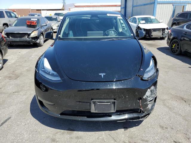 Photo 5 from auction – 2022 TESLA MODEL Y with VIN 7SAYGDEEXNF481297