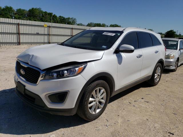 KIA SORENTO LX 2018 with VIN 5XYPG4A33JG404836 - Photo from auction