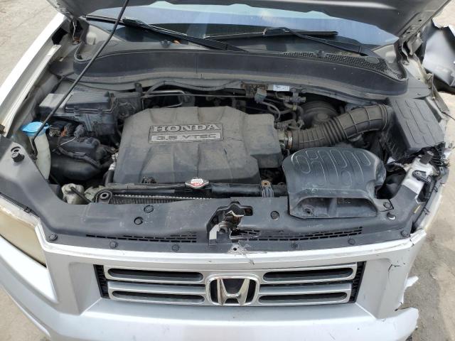 Photo 11 from auction – 2007 HONDA RIDGELINE with VIN 2HJYK16547H522525