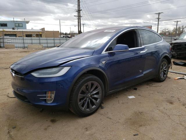 TESLA MODEL X 2018 with VIN 5YJXCDE22JF091007 - Photo from auction