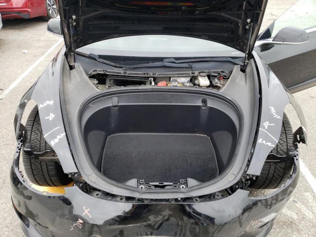 Photo 11 from auction – 2018 TESLA MODEL 3 with VIN 5YJ3E1EA8JF171913