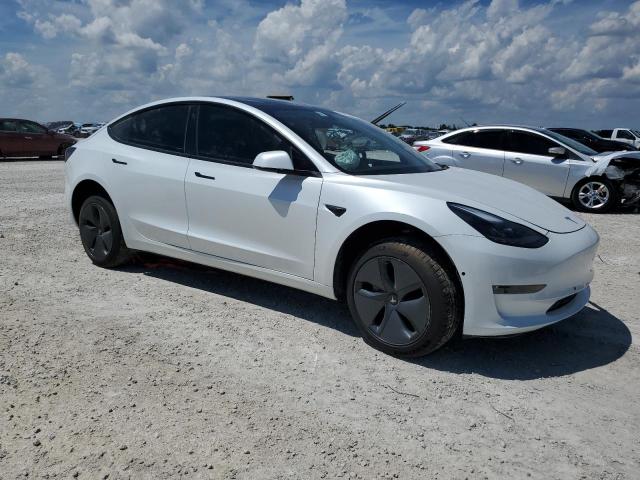 Photo 4 from auction – 2021 TESLA MODEL 3 with VIN 5YJ3E1EB5MF983375
