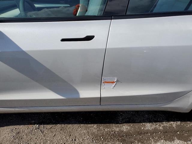 Photo 12 from auction – 2021 TESLA MODEL 3 with VIN 5YJ3E1EA4MF047755