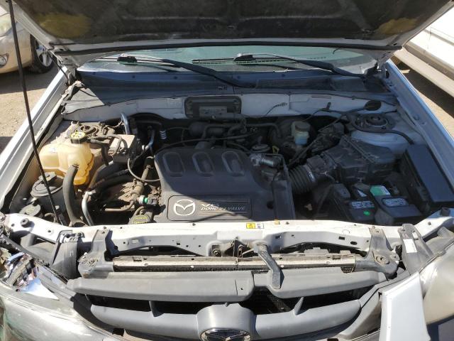 Photo 11 from auction – 2003 MAZDA TRIBUTE LX with VIN 4F2YZ04103KM46895