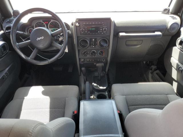 Photo 8 from auction – 2009 JEEP WRANGLER U with VIN 1J4GA69169L703456
