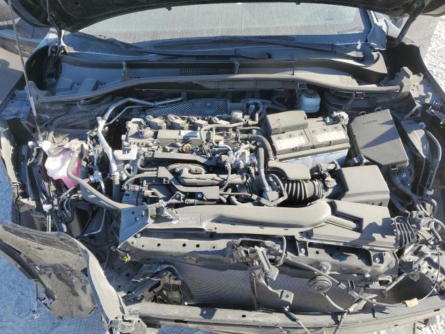 Photo 12 from auction – 2022 TOYOTA COROLLA CR with VIN 7MUDAAAG8NV002332