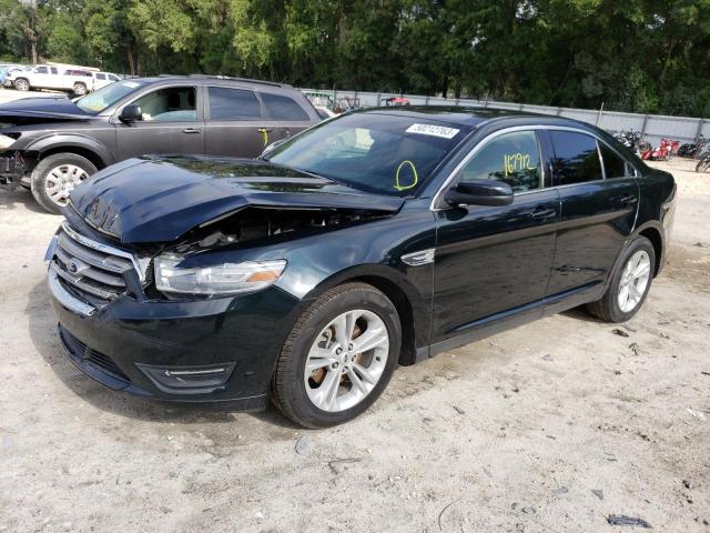 FORD TAURUS SEL 2014 with VIN 1FAHP2E85EG148223 - Photo from auction