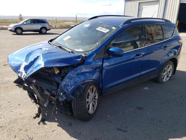 FORD ESCAPE SE 2018 with VIN 1FMCU0GD9JUB85634 - Photo from auction