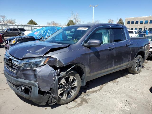 Photo 1 from auction – 2020 HONDA RIDGELINE with VIN 5FPYK3F57LB009874