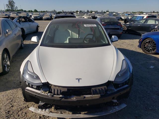 Photo 5 from auction – 2021 TESLA MODEL 3 with VIN 5YJ3E1EB4MF074141
