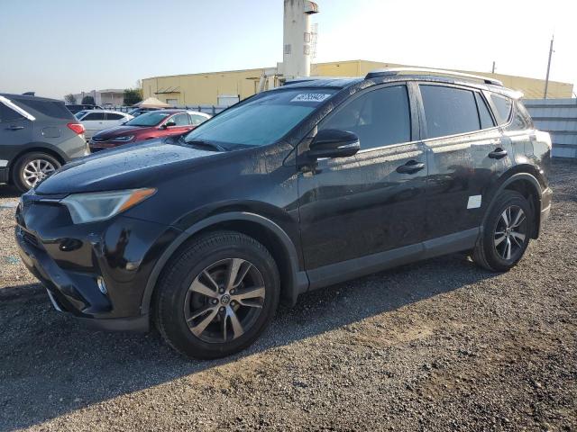 TOYOTA RAV4 XLE 2016 with VIN 2T3RFREV2GW433713 - Photo from auction