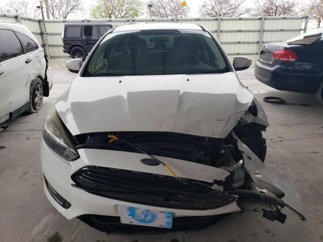 Photo 5 from auction – 2016 FORD FOCUS SE with VIN 1FADP3FE4GL210682