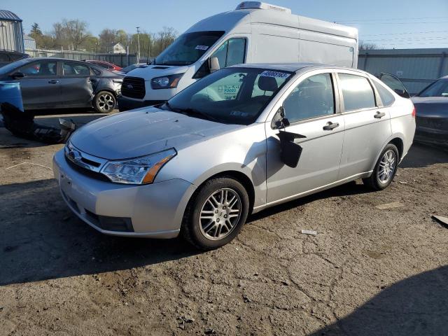 FORD FOCUS SE 2010 with VIN 1FAHP3FN7AW124533 - Photo from auction